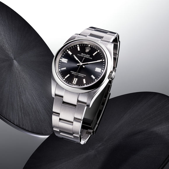 The Rolex Oyster Perpetual 41 watch. This watch is shown in Rolex's proprietary metal called Oystersteel, with a black dial. Model #124300.