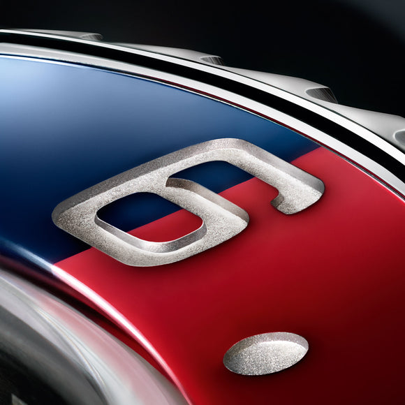 A close up view of the number 6 on the Rolex GMT Master II bezel, where the blue ceramic comes in contact with the red.