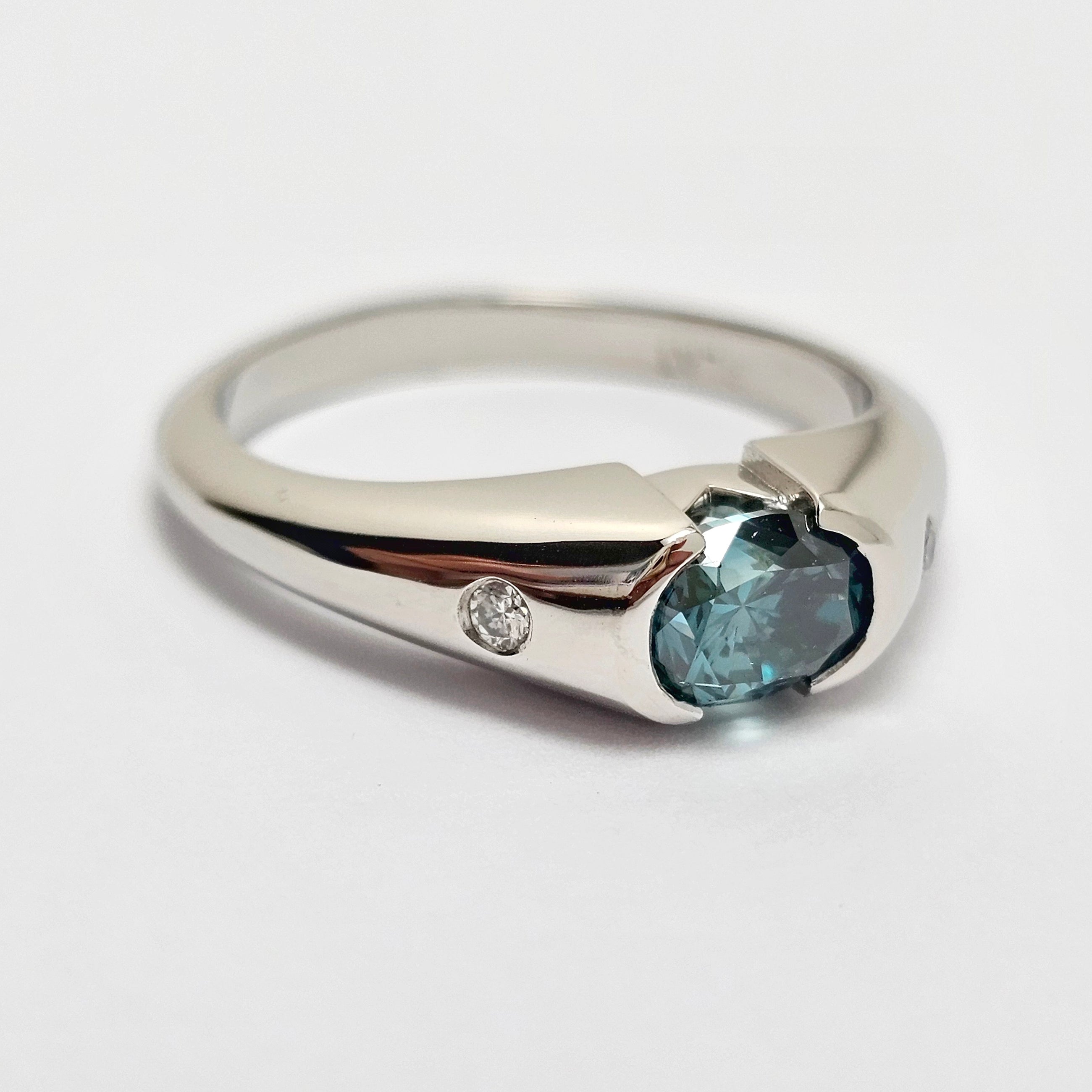 Custom Platinum Half Bezel Treated Blue Diamond Ring