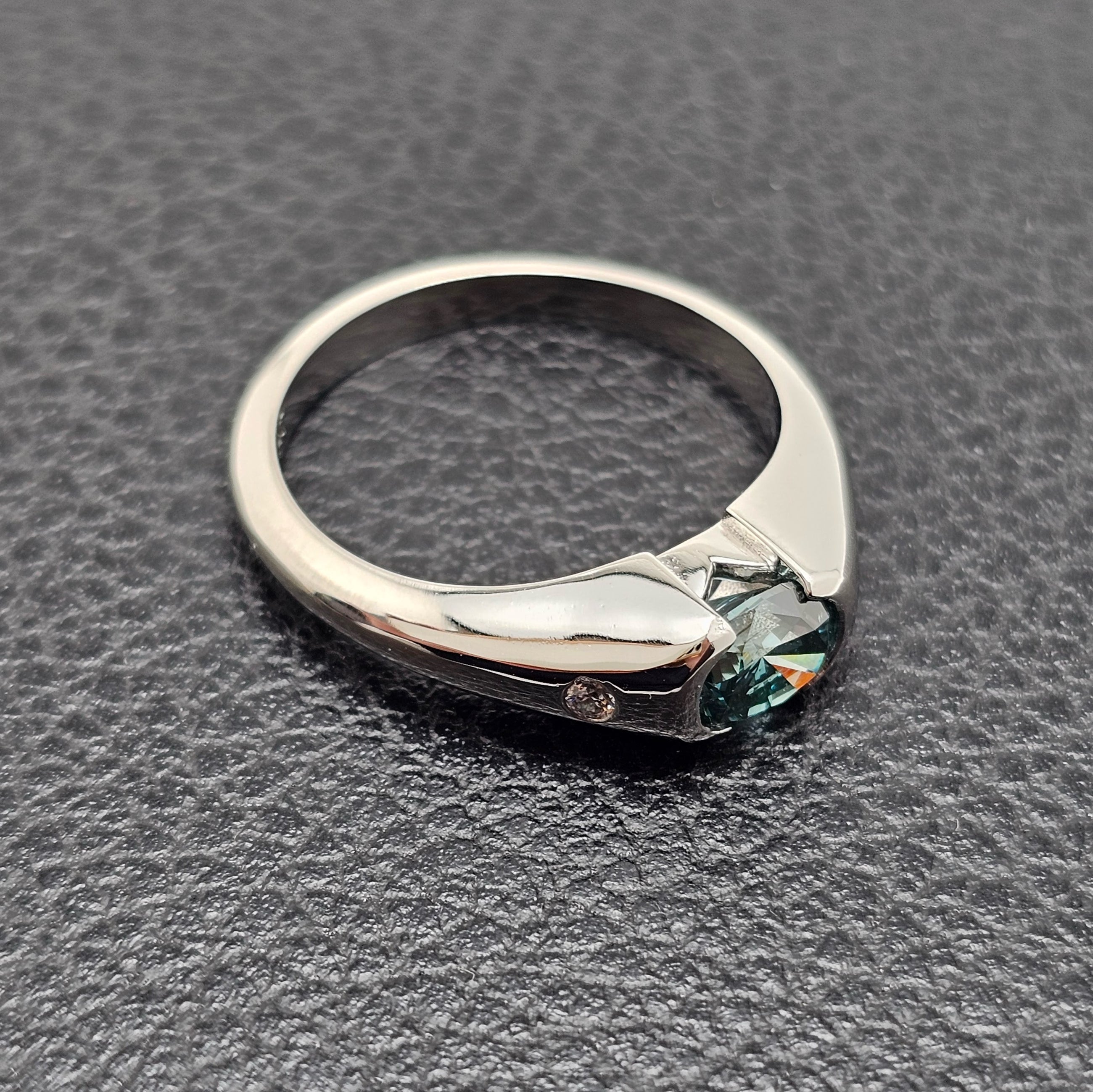 Custom Platinum Half Bezel Treated Blue Diamond Ring