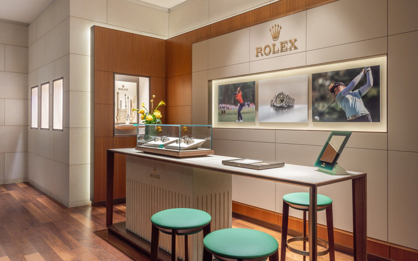 An angled shot of our Rolex display case and stools.