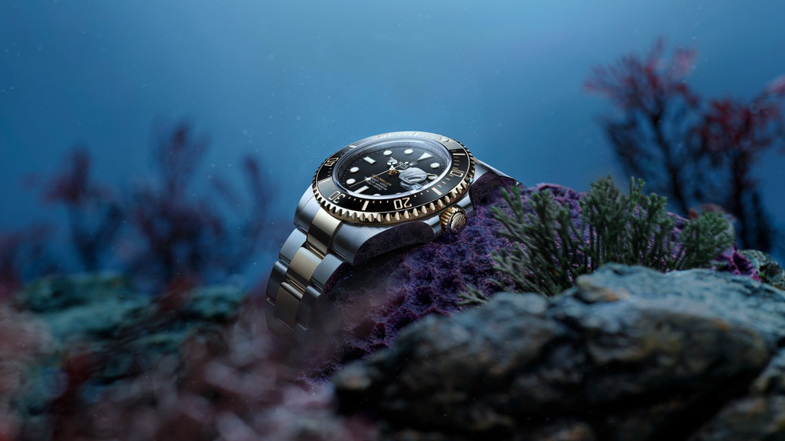 The Rolex Sea-Dweller lying at the bottom of the ocean on some coral reef. Model #126603.
