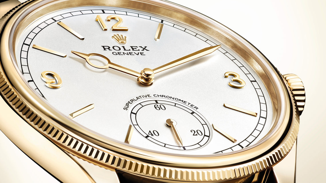 An angled picture of the Rolex Perpetual 1908 in yellow gold with a white dial. Model #52508.