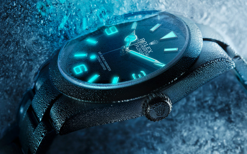 The Rolex Explorer frozen and partially stuck in ice. Ref #124270.