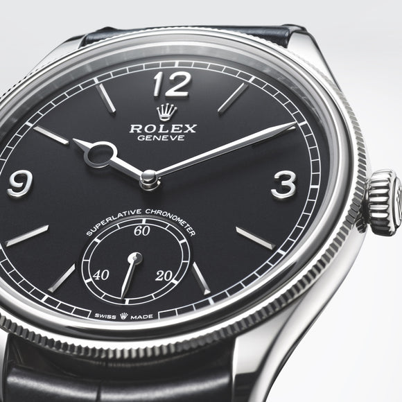 An upward look at the Rolex Perpetual 1908 in white gold with a black dial. Model #52509.
