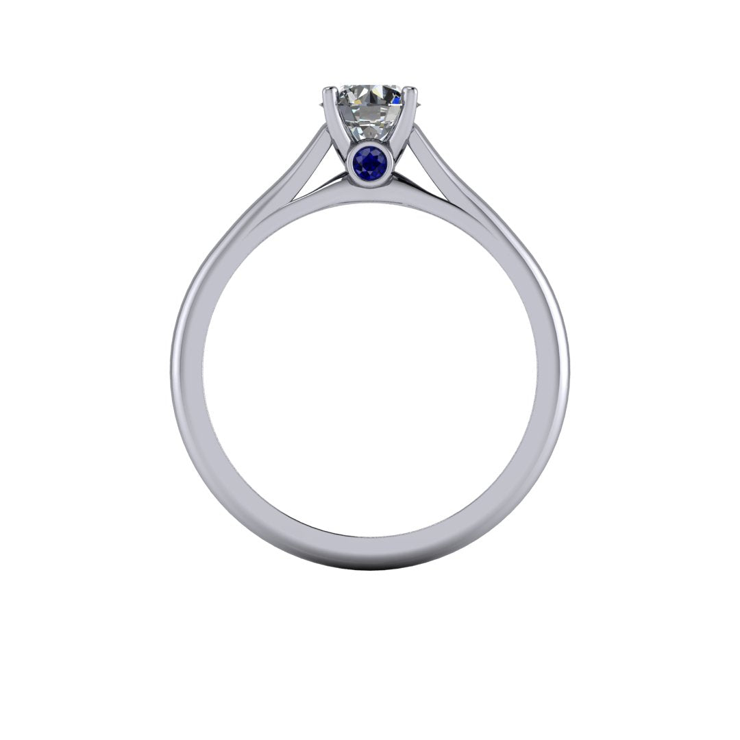 Solitaire Engagement Ring With Sapphire Accent