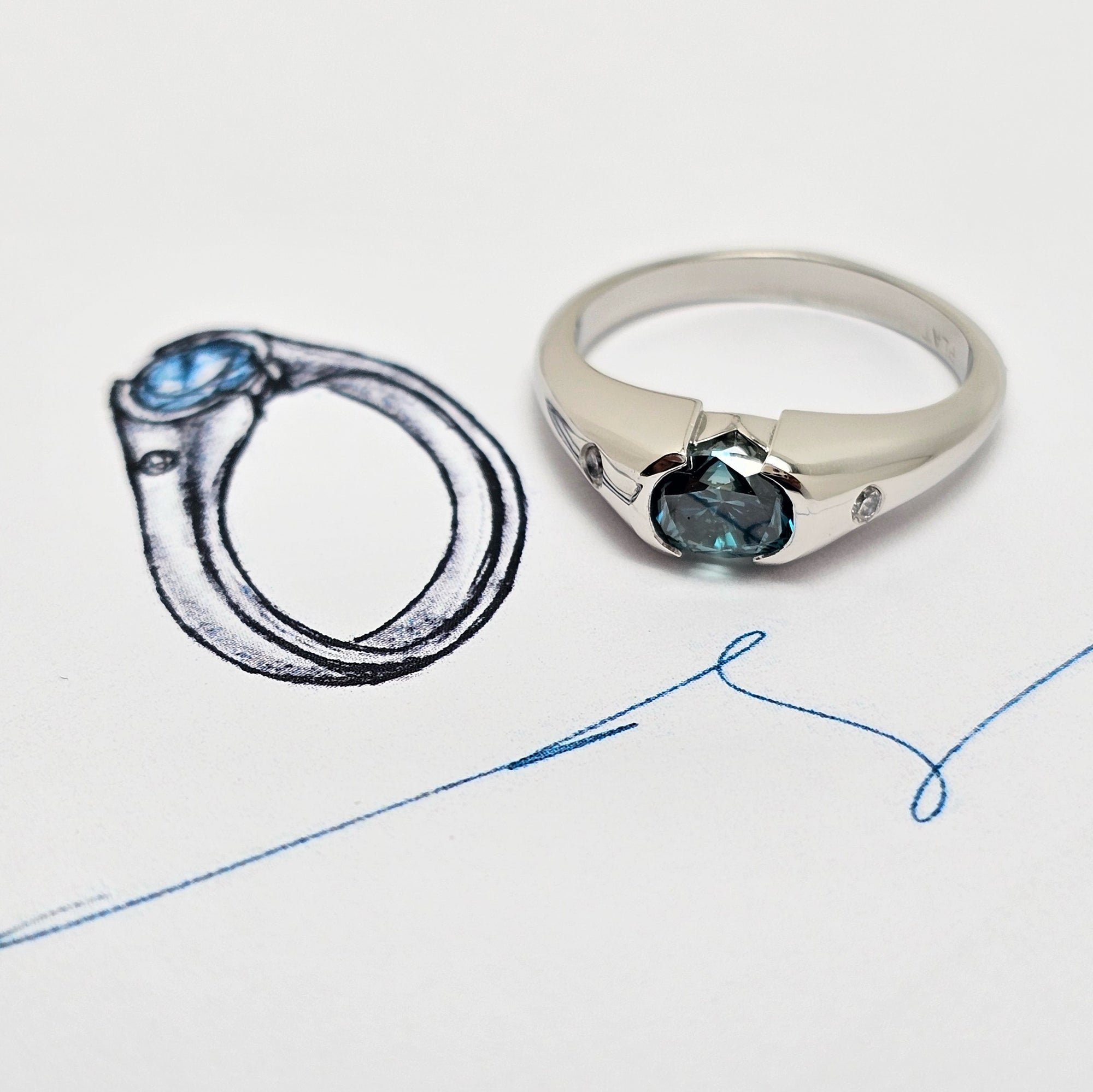 Custom Platinum Half Bezel Treated Blue Diamond Ring