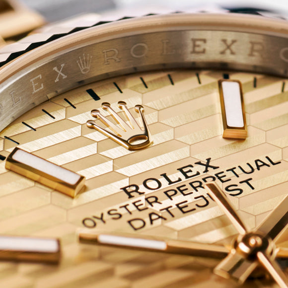 Close up image of the fluted motif dial of a Rolex Datejust 36. Model #126233.