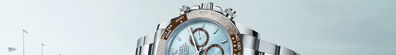Rolex Cosmograph Daytona in platinum with an ice blue dial and brown cerachrom bezel.